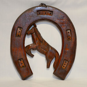 Horseshoe wood carving