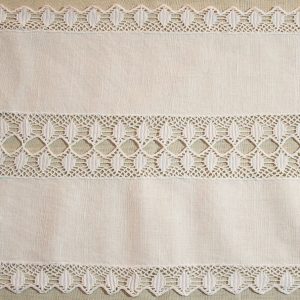 table-runner with hand-knitt lace